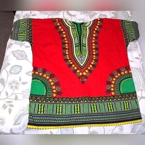A TIA colorful Dashiki Tunic top. One size fits most. EUC.